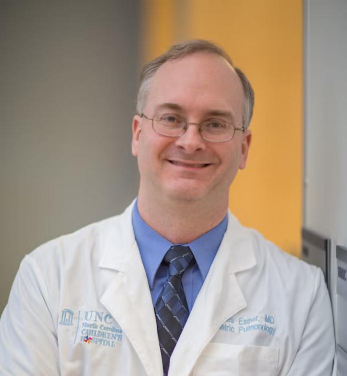 A photo of Charles Esther, MD, PhD.